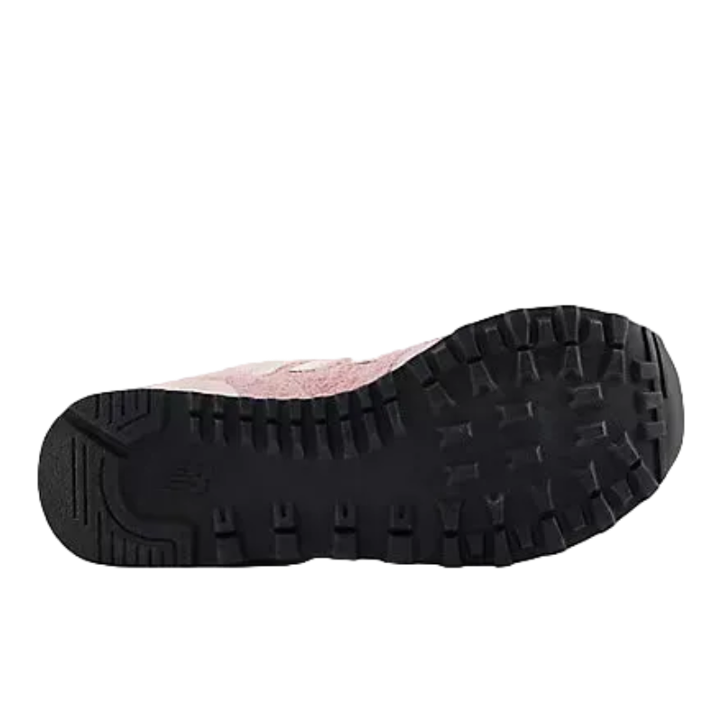 Pink sneaker with rugged black tread sole, ready for mountain trails and outdoor adventures.