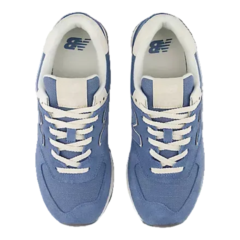 Laid-back blue sneakers with white laces, perfect for mountain town adventures