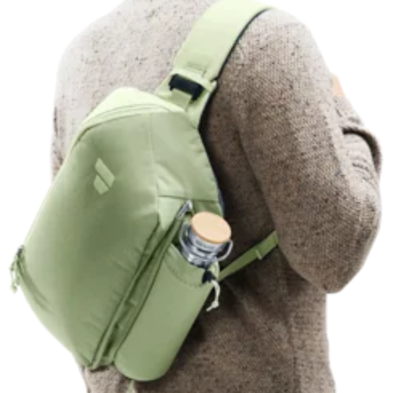 Man wearing a green backpack with a white background